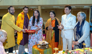 Dr. Mrs. Santosh Kumar founder and the Chief Executive Director of Universal Industries performing Vaastu Pooja ceremony