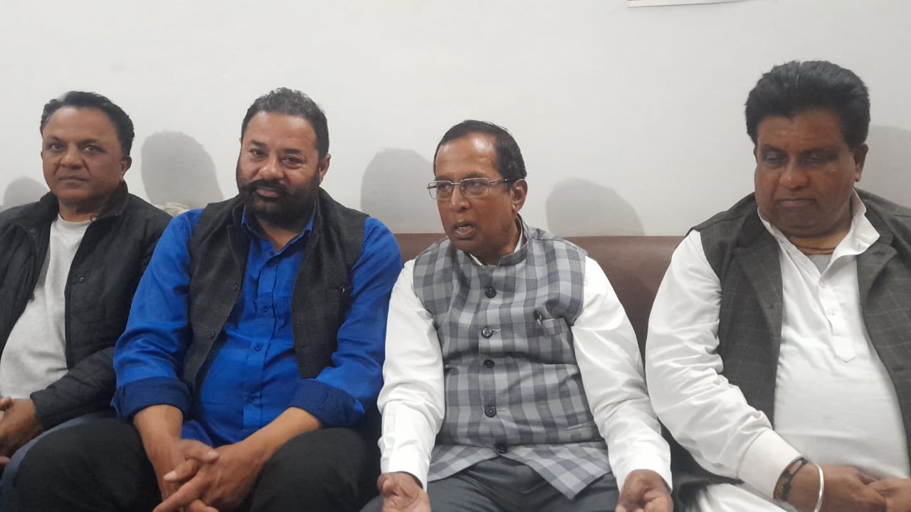 MoS Som Parkash addressing a press conference. Ex-Mayor of Phagwara municipal corporation Arun Khosla and BJP’s Phagwara Block President Paramjit Singh Chachoki are flanking him