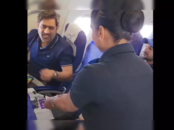 Check out how Dhoni reacted after air hostess served him chocolates with a note