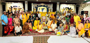 Honored seniors with temple priests and other devotees