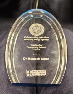 Dr. Romesh Japra, honored with Community Service Award by the Asian American Unity Coalition at Capitol Hill