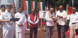 FIA Robert Lancia distributing citation to eminent community Members