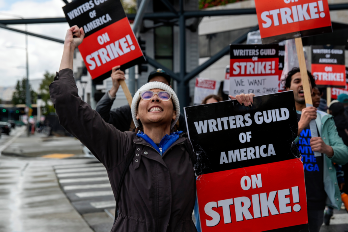 Hollywood writers strike officially ends after 148 days