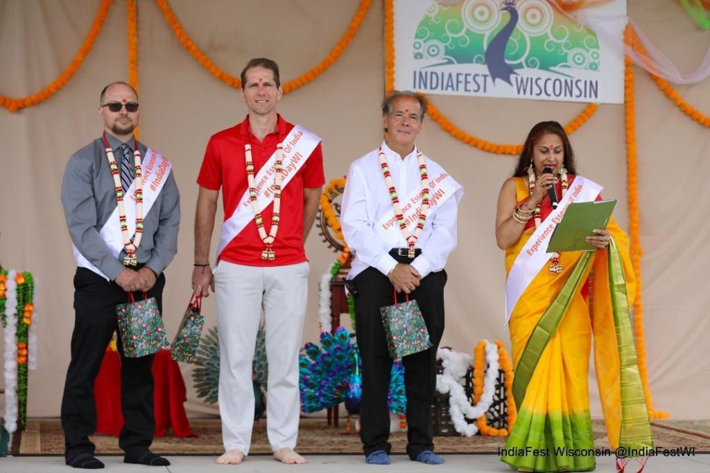 Welcoming guests to Wisconsin India Day 2023. Clockwise: Menomonee Falls Village President Jeremy Walz, Waukesha County Supervisor Jacob LaFontain, U.S. National Anthem singer Joseph Scala, Founder, Purnima Nath, reading proclamations from Governor.