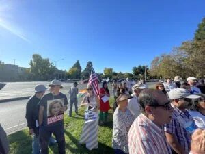 Hindu (Indian) Americans and Jewish people with posters and flags