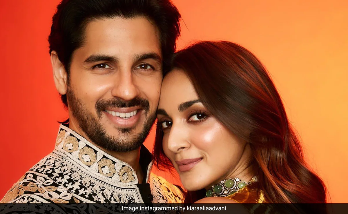 Sidharth's tight hug for Kiara as they pose for Diwali picture