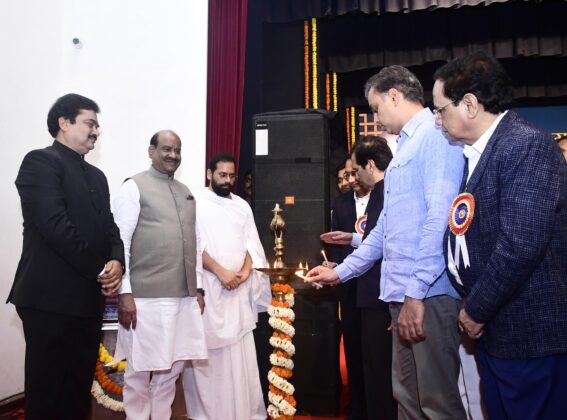 Lighting of lamp in front of the picture of Lord Mahavira