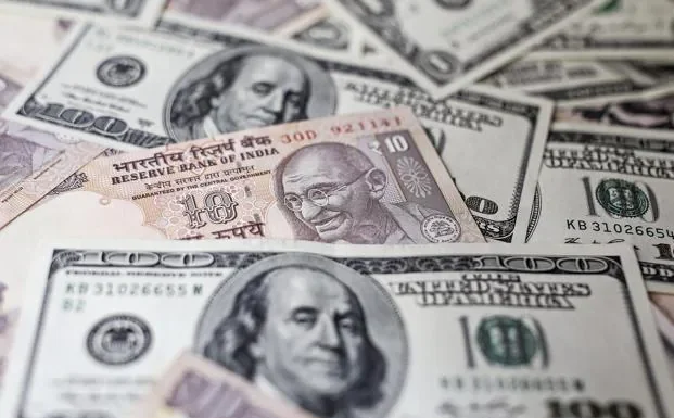Rupee hits 95 mark against dollar amid oil surge, RBI curbs Rupee