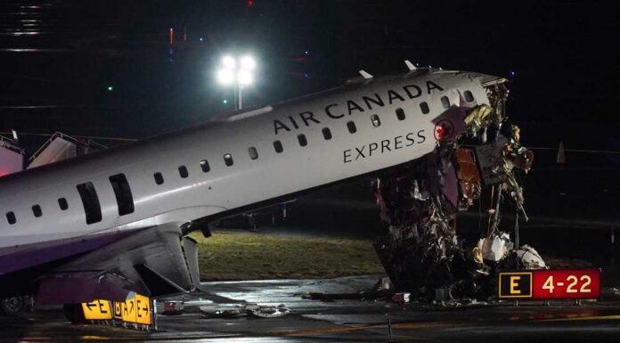 Two pilots killed as plane collides with fire truck at New York airport Plane