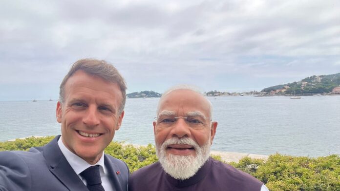 Macron's one-word captioned selfie with PM Modi goes viral Macron